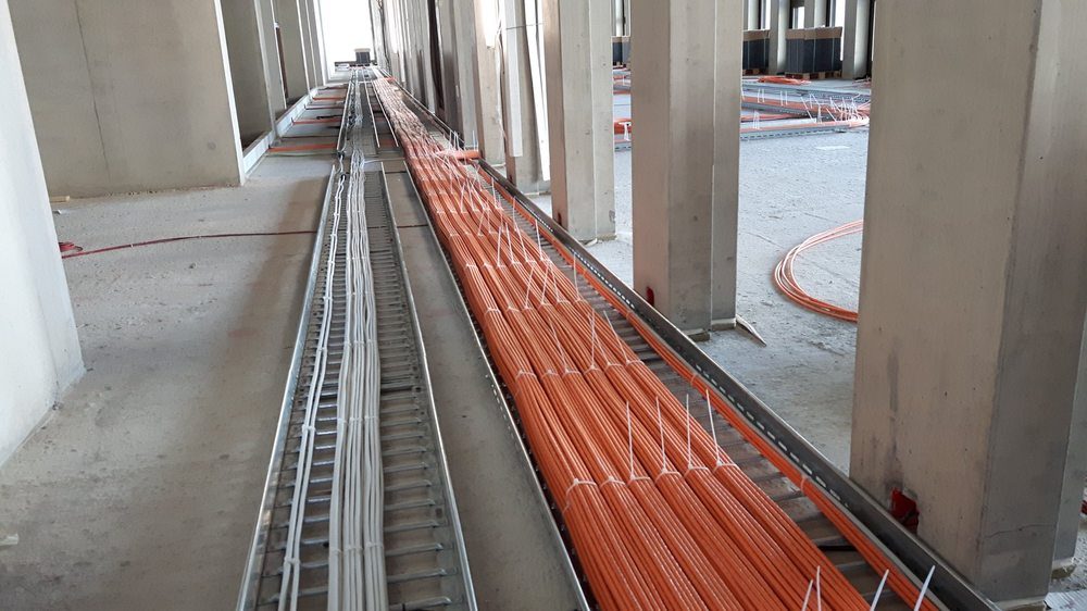 Cat6 cable runs on a cable tray in new construction