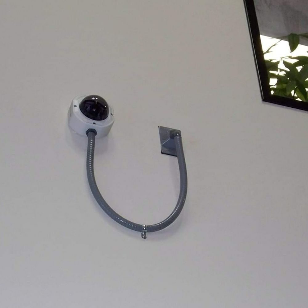 Dome security camera on a commercial building