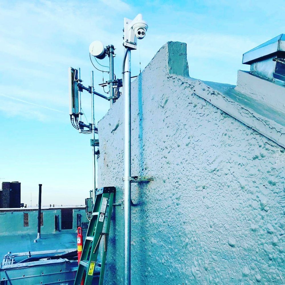 Rooftop camera and wireless equipment installation